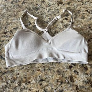 Women’s cream colored padded, sports bra
